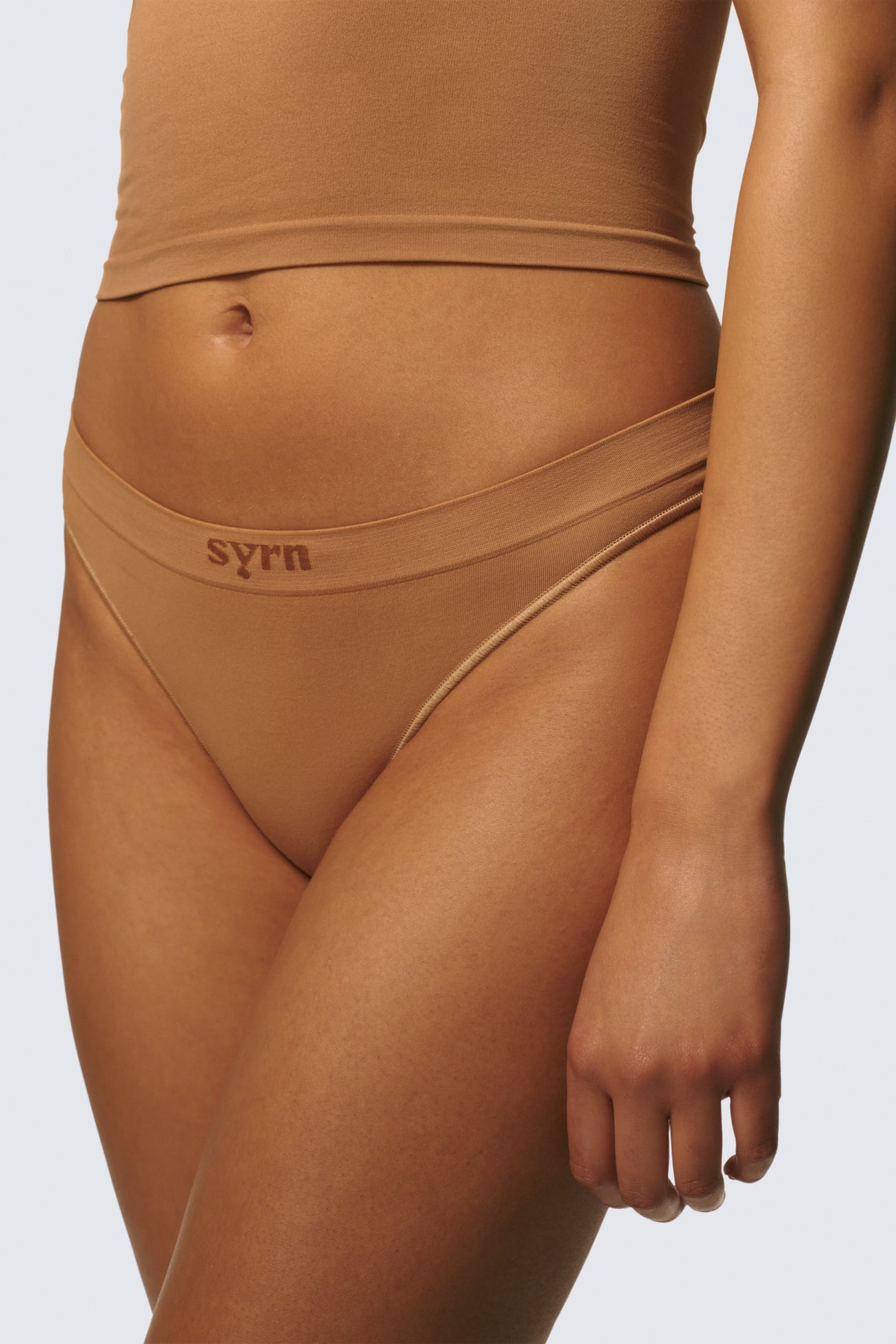 Michaela is 5’8 and wears sizes 34DD and M on top and S on the bottom