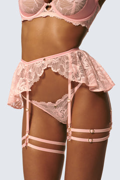 Angela is 5'11 and wears sizes 32DDD and XS