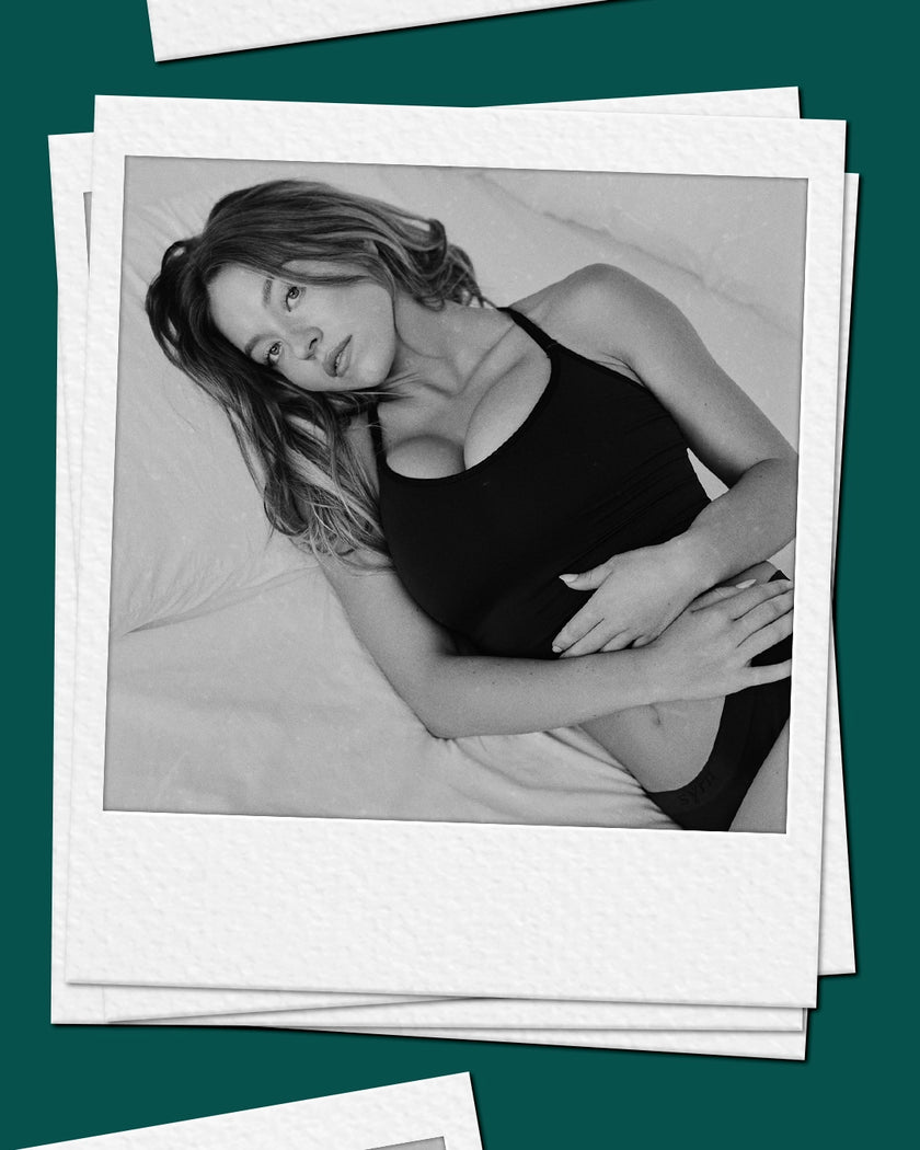 Stack of polaroids on a green backround. Top polaroid has a black and white image of Sydney Sweeney in the Lowdown Cami in After Dark / black